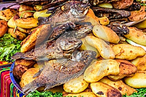 Fried fish & potatoes on streetside stall, Santiago Sacatepequez, Guatemala