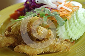 fried fish and salad dish