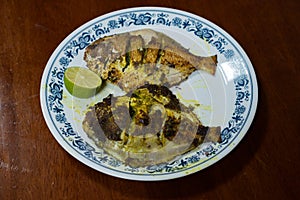 Fried fish served on a plate