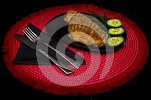 fried fish served on a plate