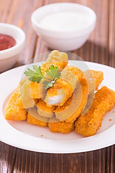 Fried fish sticks  fingers  or chicken nugget