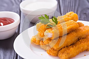 Fried fish sticks  fingers  or chicken nugget