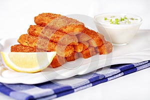Fried fish sticks with remoulade photo