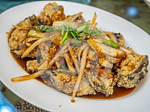 Fried fish with vegetables in Chinese style