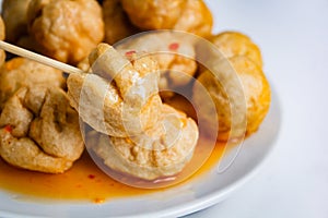 Fried fishballs and sweet sauce.