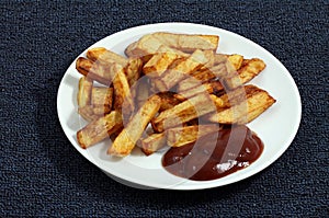 Fried French fries with sauce largely