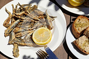 Fried fresh anchovies in the greek tavern.