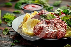 Fried Gammon steak with pineapple, french fries and vegetables