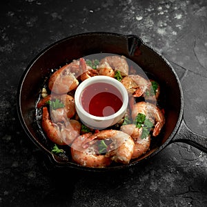 Fried in garlic butter shrimps served with sweet chili suace and parsley