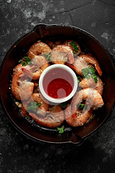 Fried in garlic butter shrimps served with sweet chili suace and parsley