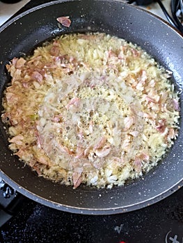 Fried garlic in a hot pan