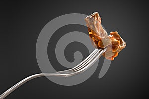 Fried giblet on fork