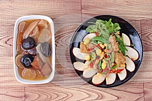 Fried ginkgo with mixed vegetables served with brown soup and streamed Chinese medicine herb soup,