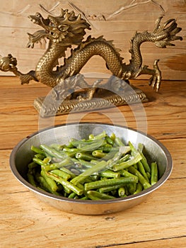 Fried green beans and Chinese antique dragon