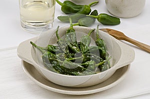 Fried green peppers. Pimientos del Padron. Spanish Cuisine. photo