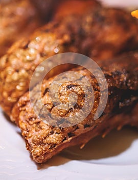 Fried grilled carp, roasted carp fish on plate with lemon and salad served in a traditional restaurant in Montenegro, Skadar lake