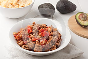 Fried ground meat with tomatoes for tacos