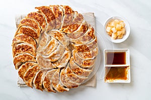 fried gyoza or dumplings snack with soy sauce