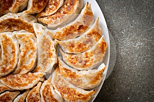 fried gyoza or dumplings snack with soy sauce