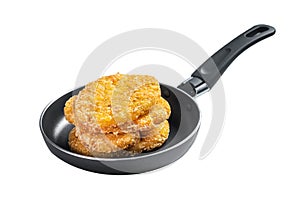 Fried Hash brown potato, hashbrown fritters in a skillet. Isolated on white background.