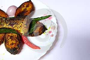 fried Hilsa fish on kitchen