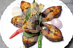 fried Hilsa fish on kitchen