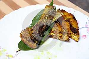 fried Hilsa fish on kitchen