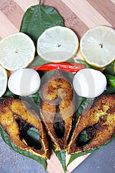 fried Hilsa fish on kitchen