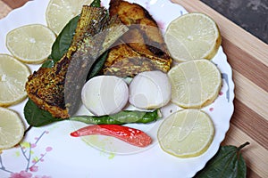 fried Hilsa fish on kitchen