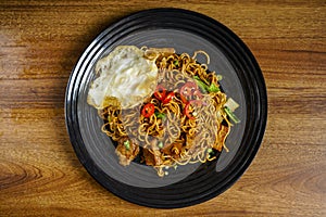 Fried Instant Noodle with fried egg.