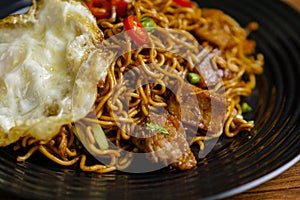 Fried Instant Noodle with fried egg.