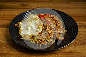 Fried Instant Noodle with fried egg.