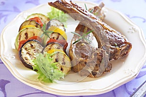 Fried lamb with vegetable garnish
