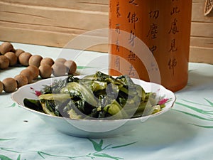 Fried lettuce in buddhist decoration