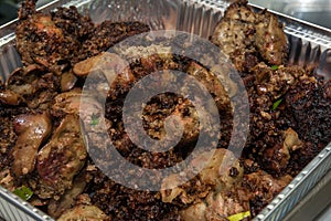 Fried liver in aluminium food box photo
