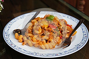 Fried macaroni with pork and eggs photo