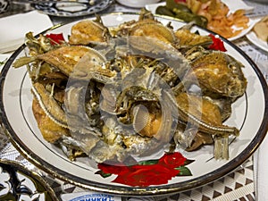 Fried marinka fish on the plate