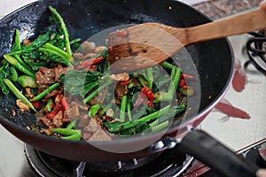 Fried meat and Chinese kale green vegetarian