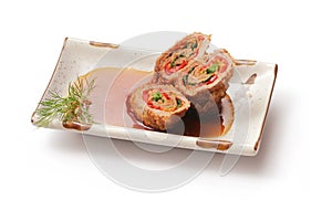 Fried meat roll with sauce and dill