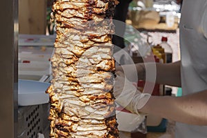 Fried meat on a skewer for cooking of donors or shawarma.