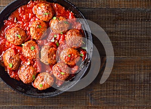 Fried meatballs with tomato sauce