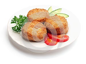 Fried meatballs with tomatoes, cucumbers