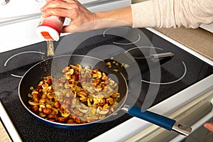 Fried mushrooms in a frying pan