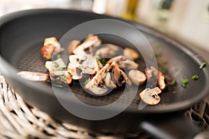 Fried mushrooms in a pan