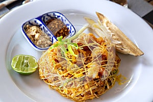 Fried noodle wrapped with eggs, Thai style food , Pad thai