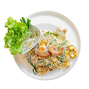 Fried noodles or Pad Thai with Fresh Shrimp, spring onions and tofu And lettuce, bean sprouts on a plate isolated white background