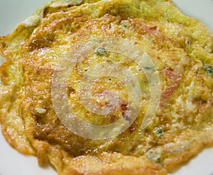 FRIED OMELETE OR OMELETTE WITH VEGETABLES