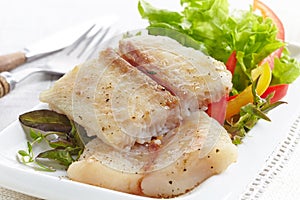 Fried pangasius fish fillet pieces