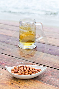 Fried peel peanuts and beer