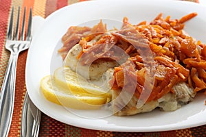 Fried plaice with carrot and lemon